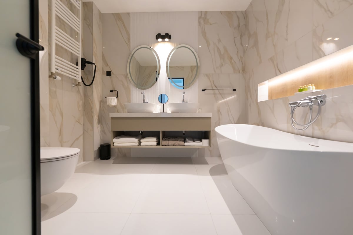 Luxury spa bathroom with freestanding tub and elegant tile